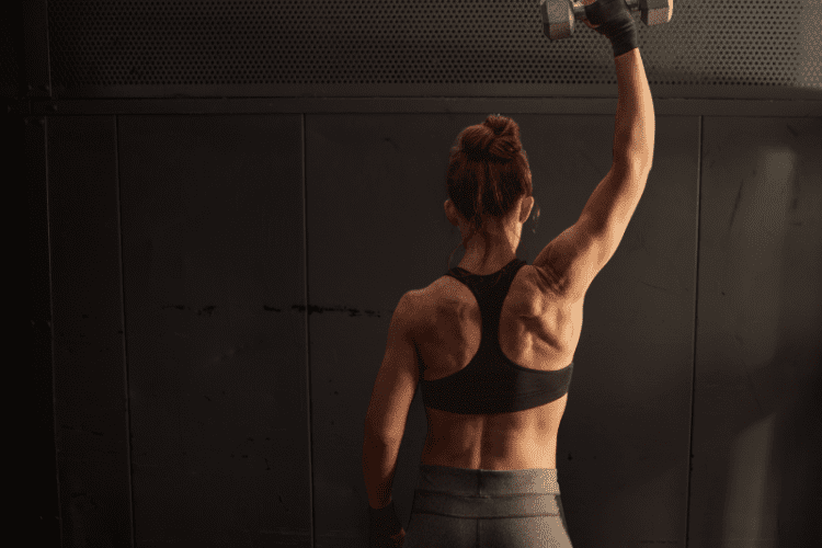 woman over 40 strength training to support metabolism and peptide therapy benefits