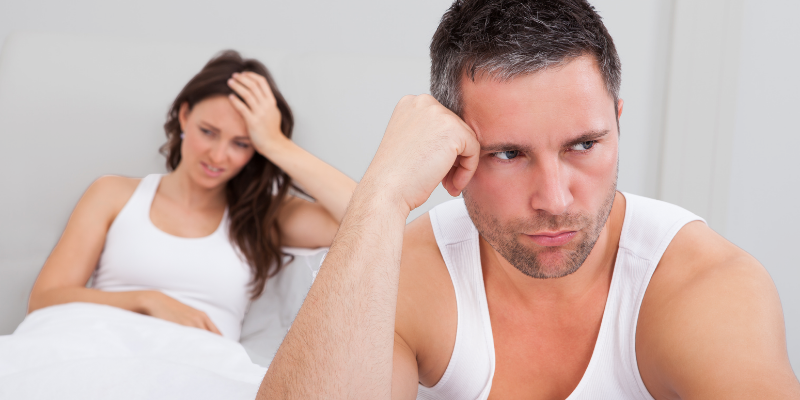 Adult man experiencing low mood and reduced vitality, commonly associated with hormonal imbalance and altered estrogen-to-testosterone balance after 40