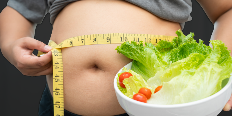 Chronic calorie restriction and dieting focused on eating less, often contributing to stalled fat loss after 40